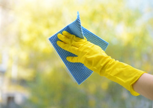 Detailed post-construction cleaning of kitchen cabinets and worktops in Pimlico